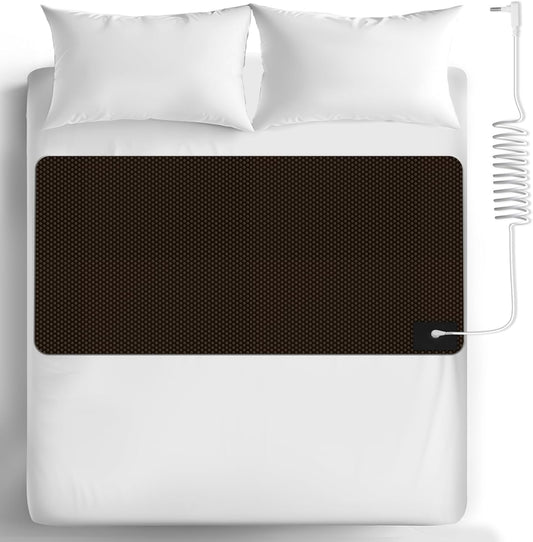 YONWOLD grounding sleeping mat on a white bed with connecting cord and plug